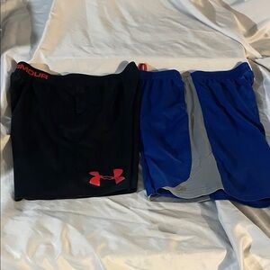 Two pair Under Armour Athletic Shorts,Blue with and Black.